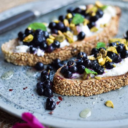 Nordic Ricotta toast with wild blueberries and pistachios